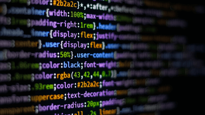 A close-up of multicoloured CSS code on a dark screen.