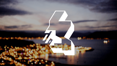 A white geometric outline of Scotland over a blurred view from Greenock towards Gourock, with waterfront lights at dusk.